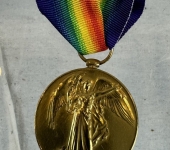 Victory Medal Named to Captain MacAulay