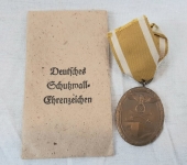West Wall Medal and Paper Envelope